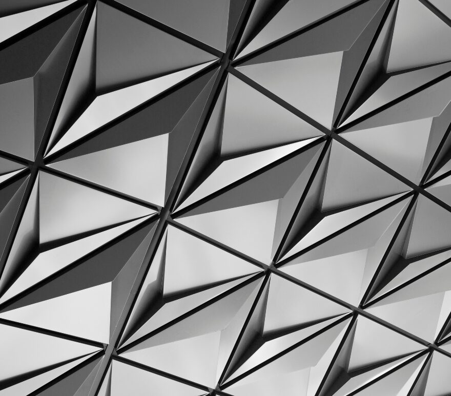 Abstract geometric pattern of triangular shapes in black and white.